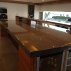 Brown Emperador Marble Island Bench coated with Clearstone